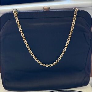 Vintage black purse with gold color accents